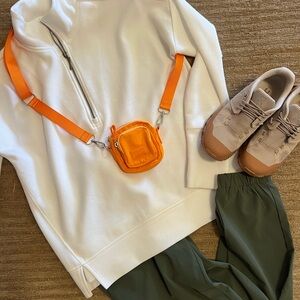 NWOT Urban Outfitter tiny crossbody bag in orange